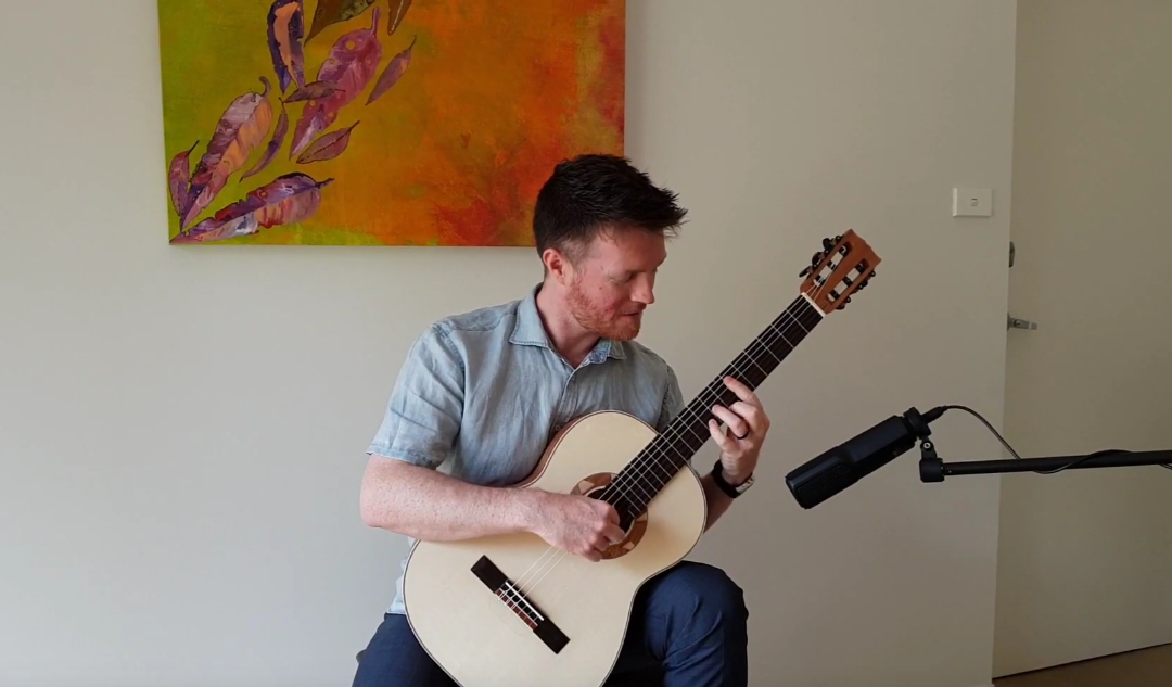 Matt Withers plays a Toscano Classical Guitar